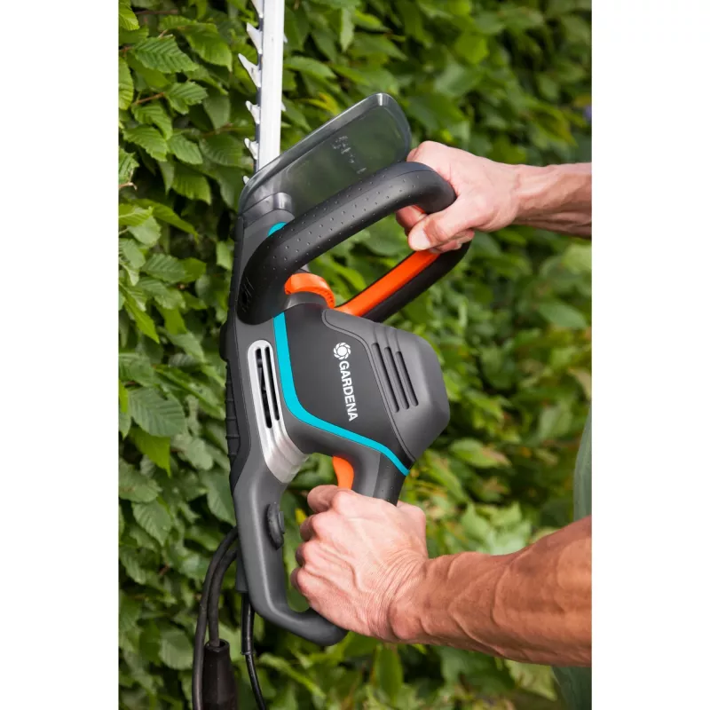 Gardena elektrinis gyvatvorių žirglys PowerCut 700/65, 65 cm, dviguba geležtė, 2.7 cm, oranžinė, juoda, mėlyna, 3.1 m/s², 87 dB