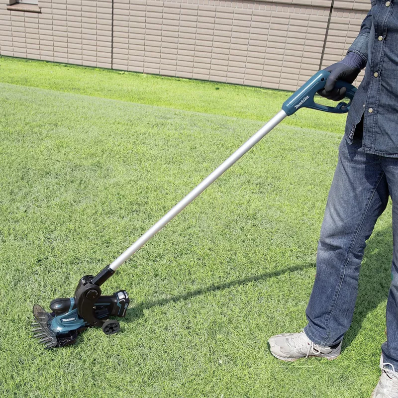 UM600DSMEX akumuliatorinės žolės žirklės 10,8 V mėlynos juodos 2x Li-ion baterija 4,0 Ah