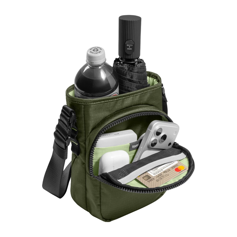 Tomtoc GameOn-G50 Switch 2 JoyCarry Sling Bag žalias — nešiojimo krepšys, skirtas Nintendo Switch OLED ir Switch 2