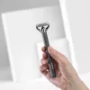 Barzdos kirpimo mašinėlė BABYLISS OT996E su metaliniais peiliukais ir reguliuojamo ilgio nustatymais