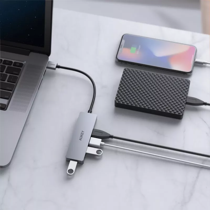 USB šakotuvas Aukey CB-H36 — 4 prievadų USB 3.2 Gen 1 Type-A, prieglobos USB 2.0, 5000 Mbit/s, aliuminis sidabrinis