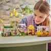 LEGO rinkinys LEGO FRIENDS 42671 Augalų kavinės ir gėlių parduotuvės žaidimų rinkinys su kavinės ir gėlių parduotuvės funkcijomis