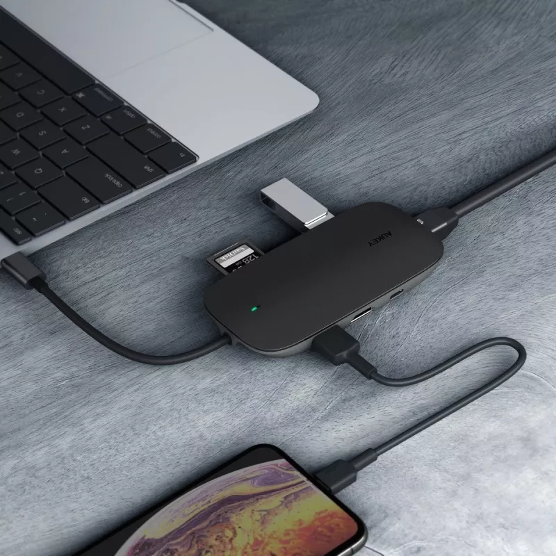 Nešiojamojo kompiuterio dokas AUKEY CB-C71 — 3x USB‑C (USB 3.2 Gen1), HDMI, RJ‑45, MicroSD, USB PD 100 W, 0,15 m kabelis, juodas
