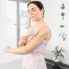 Rankinis riedėjimo masažuoklis Medisana AC 950 — belaidis Li‑Ion, 2 galios lygiai, ergonomiškos rankenos, 381 g, rožinis auksas/baltas