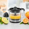 Rommelsbacher citrusų presas, 30 vatų galia, 600 ml talpa, sukimas pagal ir prieš laikrodžio rodyklę, du presavimo kūgiai (ZP 50)