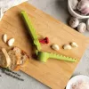 Rankeninis česnakų spaustukas Ototo Design Garligator žalios spalvos plastiko ir plieno