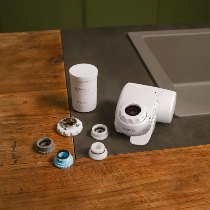 Vandens čiaupo filtras BRITA ON TAP V CU CE2 (1052067) — 4 pakopų, 600 L talpa, 3 režimai, 5 adapteriai, baltas