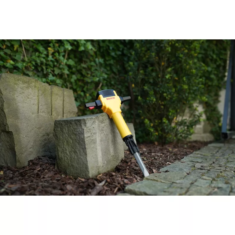Theo Klein 8405 Bosch plaktukas gręžtuvas I maitinamas baterijomis grąžto judėjimas aukštyn-žemyn I su variklio garsu ir mirksinčia lempute I matmenys: 28 cm x 7 cm