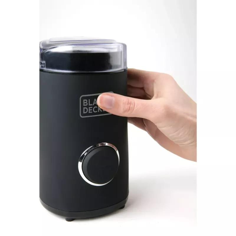 Kavos malūnėlis Juoda & Decker BXCG150E — 150 W, 50 g talpa, nerūdijančio plieno peiliai, mygtukinis valdymas