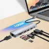 Manhattan USB-C dokas / šakotuvas su kortelių skaitytuvu, prievadai (x5): Ethernet, HDMI, USB-A (x2) ir USB-C, su Power Delivery (PD) iki 100 W – reikalingas išorinis USB-C įkroviklis (nepridedamas). Maitinamas per USB (nereikia išorinio maitinimo šaltinio), kai PD nenaudojamas