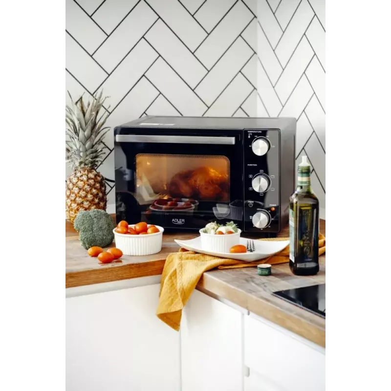 Elektrinė stalinė orkaitė Adler AD 6024 — kompaktiška 22 l talpa, 1300 W, juoda