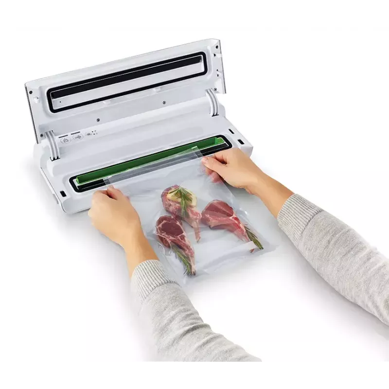 Vakuuminis sandariklis FoodSaver VS0100X — sukamoji rankenėlė, komplekte ritinėlis ir 4 vakuuminiai maišeliai, sidabrinės baltos spalvos