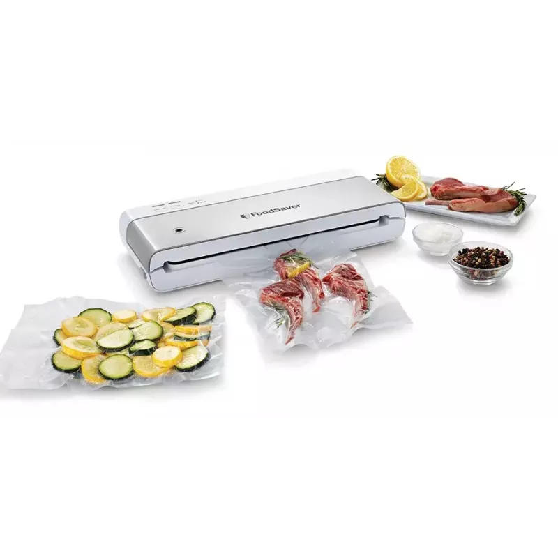 Vakuuminis sandariklis FoodSaver VS0100X — sukamoji rankenėlė, komplekte ritinėlis ir 4 vakuuminiai maišeliai, sidabrinės baltos spalvos