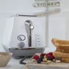 Skrudintuvas De’Longhi CTOC2103.W 2 riekėms 900 W baltas nerūdijantis plienas