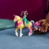 Mini lėlių rinkinys Usorteret Unicorn Academy Ava & Leaf Power of Friendship su permatomu balnu ir 2 priedais, 168 mm, plastikas