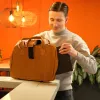 R-Go Tools nešiojamojo kompiuterio krepšys R-Go Viva, natūralios odos, su integruotu nešiojamojo kompiuterio stovu, petnešos dirželiu, 15,6 col., rudas