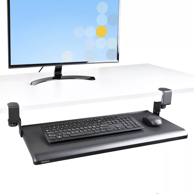 StarTech.com po stalu montuojamas klaviatūros dėklas, prispaudžiamas ergonominis klaviatūros laikiklis, iki 12 kg (26,5 svaro), stumdomas klaviatūros ir pelės stalčius su C formos spaustukais, aukščio reguliuojamas klaviatūros dėklas (3,9/4,7/5,5 col.)