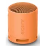 Sony SRS-XB100 - belaidis nešiojamasis garsiakalbis, patvarus IP67 atsparus vandeniui ir dulkėms, 16 val. baterija, ekologiškas, lauko ir kelionių, oranžinės spalvos