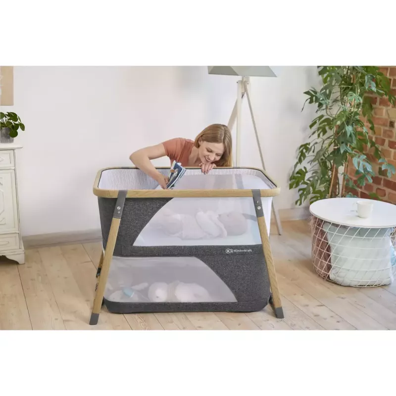 Kinderkraft Sofi pilka kelioninė lovelė kūdikiams, maksimali apkrova 15 kg