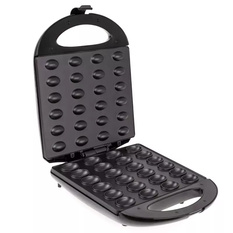 Vaflinė Mesko MS 3041 — 1600 W, juoda, pagamina 24 elipsės formos vaflius (220–240 V)