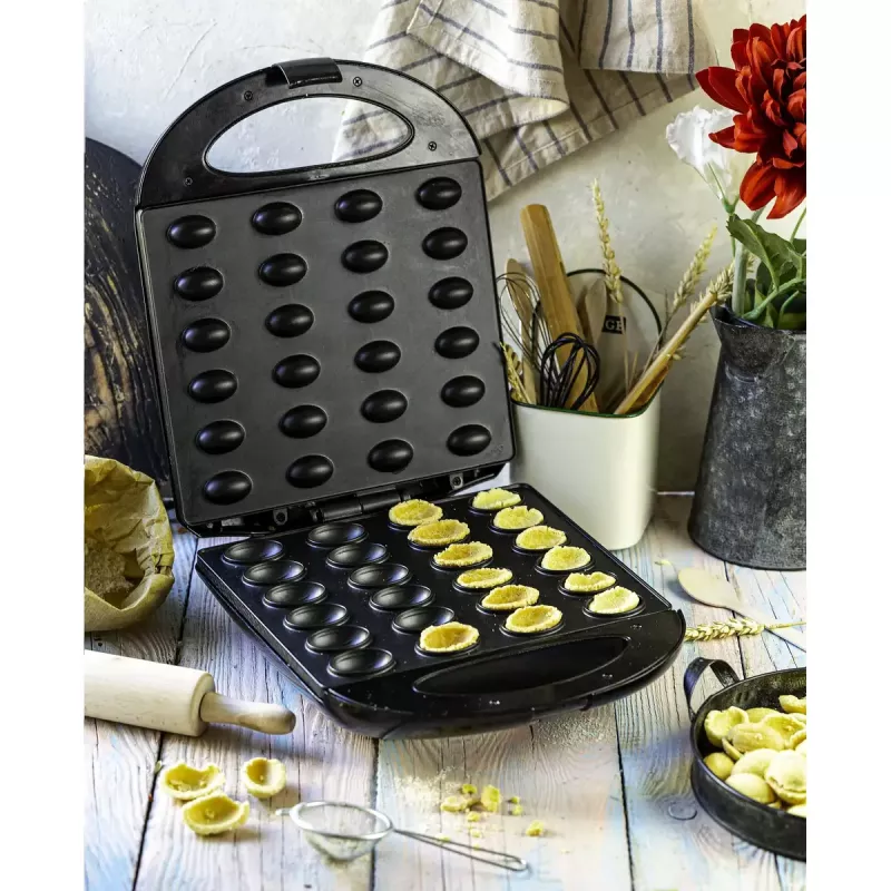 Vaflinė Mesko MS 3041 — 1600 W, juoda, pagamina 24 elipsės formos vaflius (220–240 V)