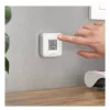 Prie sienos tvirtinamas belaidis išmanusis valdiklis FRITZ Smart Control 440 — baltas, 69×69×18 mm