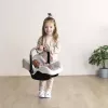 Lėlės automobilinė kėdutė Simba-Dickie Maxi-Cosi, smėlio spalvos — aksesuaras lėlėms