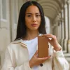 Dėklas-knygelė dbramante1928 Lynge Samsung Galaxy S22 Ultra, tan, tinka iki 17,3 cm (6,8 col.) ekranui, stalinis stovas