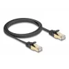 Tinklo kabelis DeLOCK RJ45 Plokščias 1m Cat6A Juodas