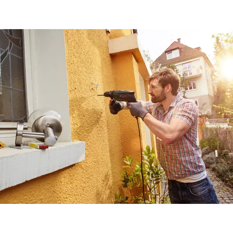 Bosch Universal Impact 800 3000 aps./min. be rakto 1,7 kg juoda, žalia