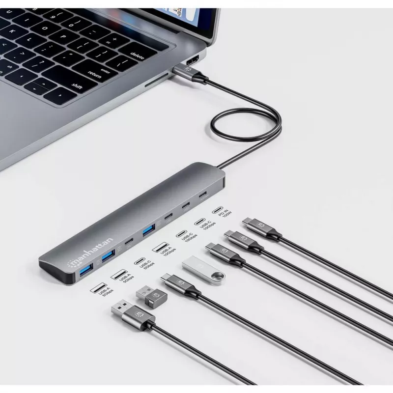 Manhattan USB-C dokas / šakotuvas, prievadai (7 vnt.): USB-A (3 vnt.) ir USB-C (4 vnt.), su Power Delivery (PD) 100 W – reikalingas išorinis USB-C įkroviklis (nepridedamas). Maitinamas per USB (nereikia išorinio maitinimo šaltinio), kai PD nenaudojamas, aliuminis