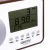 Nešiojamasis radijas Camry CR 1153 — FM nešiojamasis radijas su LCD ekranu, vienu garsiakalbiu, automatiniu skaitmeniniu derinimu, nuolatinės srovės maitinimu
