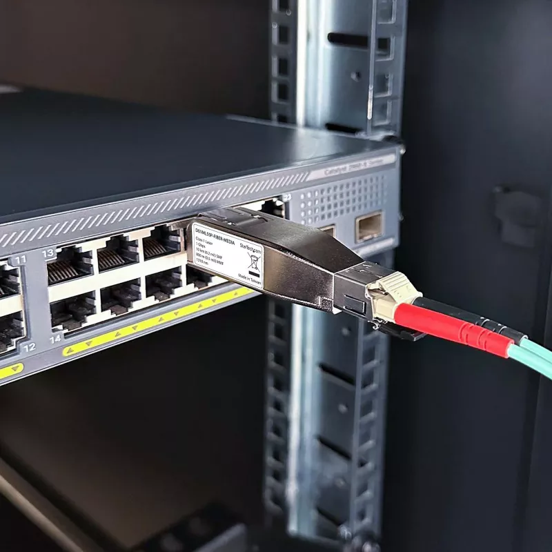 StarTech.com Gigabit Fiber to RJ45 Ethernet Media Converter Dongle, Optical Singlemode 10km/Multimode 800m, PoE Powered, Compact Design, Metal Housing, Micro Mini, TAA