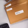 Etikečių ritinėliai Dymo 2223589 — baltos popierinės etiketės 5,4 × 2,5 cm, 500 etikečių/ritinėlyje, 12000 etikečių/pakuotėje, FSC