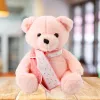 LEAN TOYS Pliušinis meškiukas su šaliku, rožinis, 35 cm