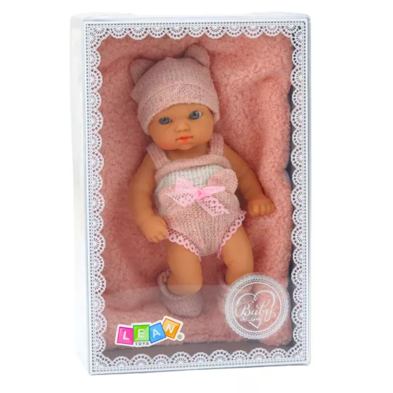LEAN TOYS Kūdikio lėlė su antklode, baltais ir rožiniais drabužiais, kepure, 18 cm