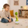 LEAN TOYS Pliušinis šokantis gyvatė interaktyvus muzikinis talismanas žalias