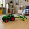 LEAN TOYS nuotoliniu valdymu valdomas ūkio traktorius su šieno grėbliu ir RC žibintais 1:24