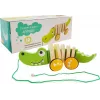 LEAN TOYS medinis krokodilas ant ratukų 18cm velkamas žaislas