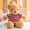 LEAN TOYS Pliušinis maskotas minkštas žaislas meškiukas dryžuotais marškinėliais kreminės spalvos 32cm