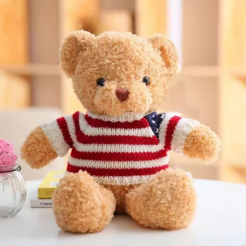 LEAN TOYS Pliušinis maskotas minkštas žaislas meškiukas dryžuotais marškinėliais kreminės spalvos 32cm