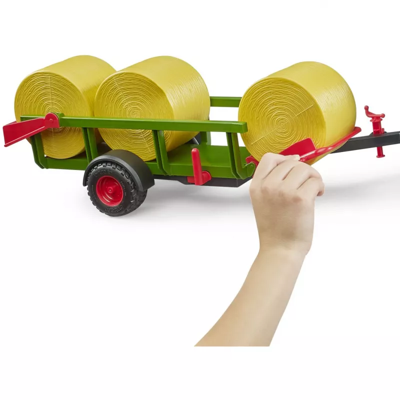 BRUDER Round Bale Collector su 3 apvaliais šieno rulonais