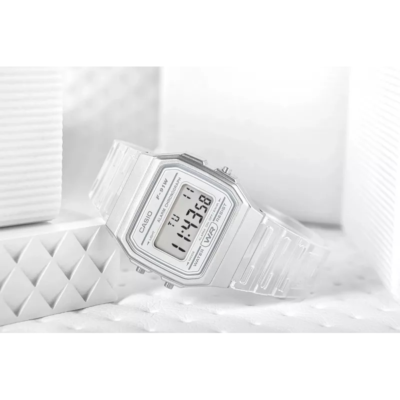 Casio F-91WS-7DF Skaitmeninis laikrodis – permatomas baltas dervos korpusas, unisex, kvarcinis, LED apšvietimas, atsparus vandeniui 3 ATM