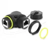 Delock RJ45 Movėjas Cat.6 Moteris į Moterį su M23 x 1.5 mm sriegiu ir apsauginiu dangteliu, 90° kampu, IP68, juodos spalvos