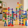 LEAN TOYS Konstrukcinis rinkinys kamuoliuko trasa su tuneliais ir spalvingais dinozaurais, 192 vnt.