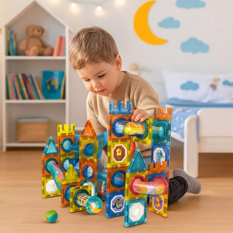 LEAN TOYS Magnetinių konstrukcinių blokelių rinkinys su kamuoliuko trasa, spalvingas, 98 vnt.