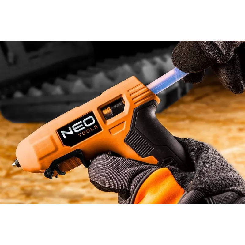 NEO Tools 17-083 20W karštų klijų pistoletas su lašėjimą mažinančiu antgaliu, 11 mm klijų lazdelėmis, integruotu stovu, 230 V, oranžinis/juodas