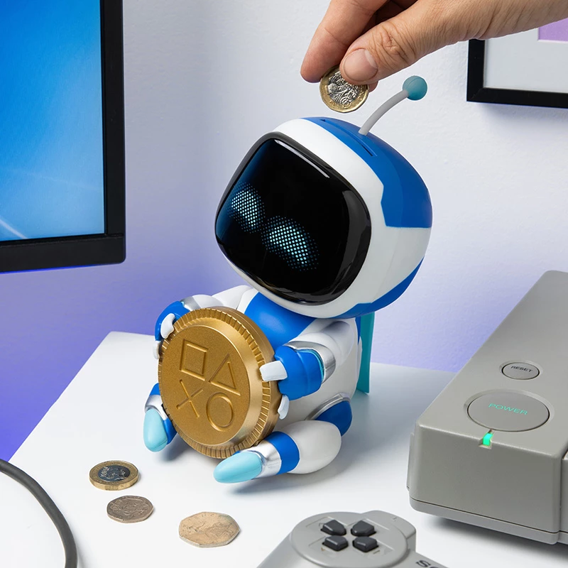 Paladone AstroBot Coin Buddies įvairiaspalvė roboto taupyklė
