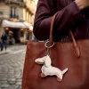 TFO Universal Phone Chain Beige Dachshund - reguliuojamas kryžminis dirželis su adapteriu