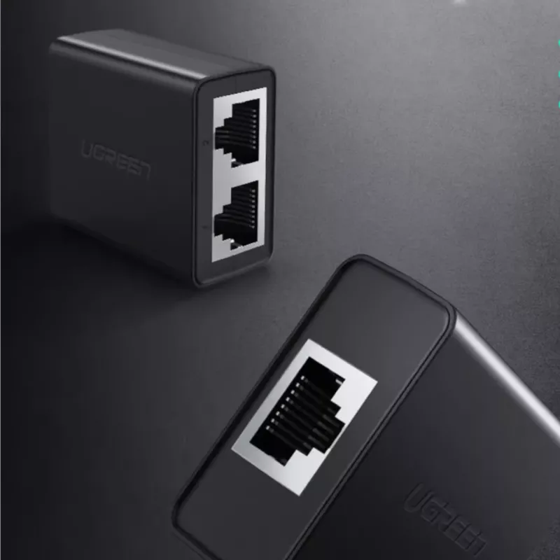 UGREEN RJ45 skirstytuvas adapteris 2 vnt. (juoda) - Ethernet tinklo skirstytuvas, 1x RJ45 vyriškas į 2x RJ45 moteriškas, 100Mbps, Cat5/Cat5e/Cat6 suderinamas, pasyvus, Plug & Play